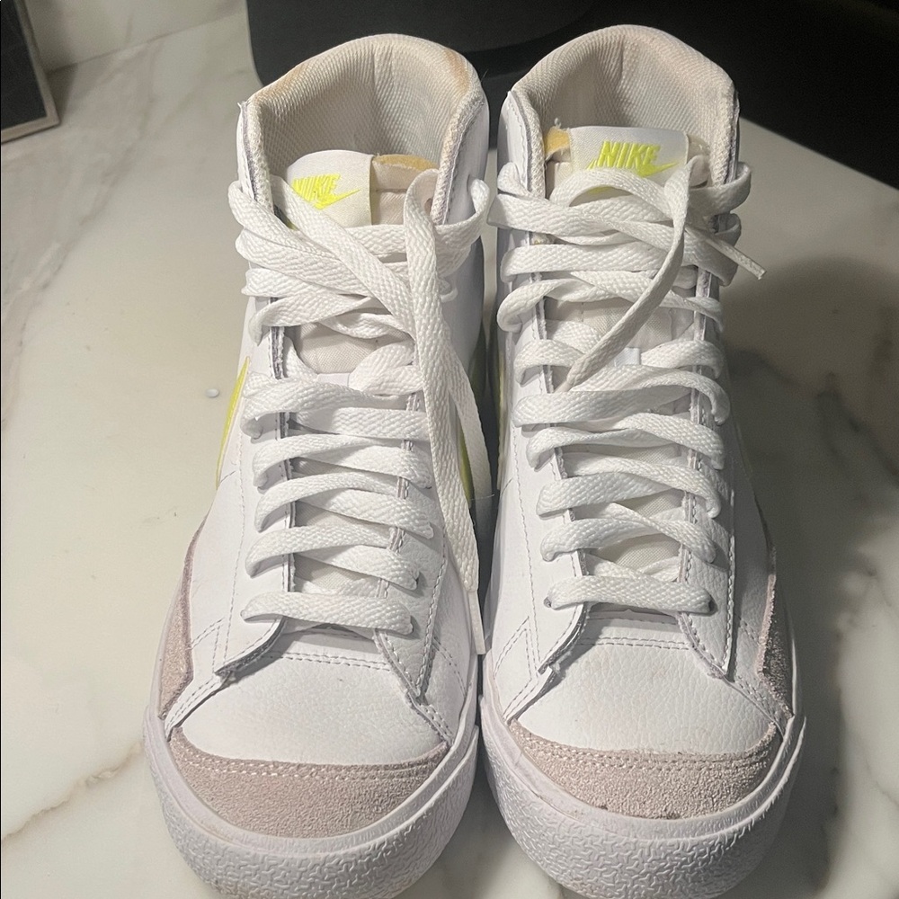 Nike Women’s White Mid-Top Sneakers with Pale Pink and Yellow Accents